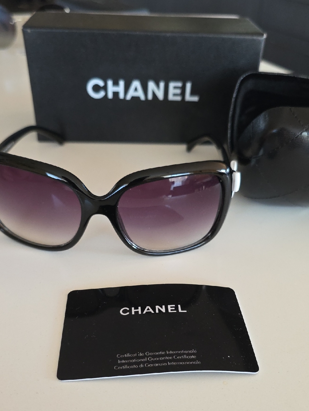 CHANEL Black Frame Authentic Sunglasses with Purple Gradient Lenses